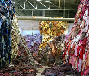 Cast-off woolen clothing is sorted in large warehouses in Haryana, India, now into basic color groups, where it's new value lies. Photograph by Tim Mitchell, www.timmitchell.co.uk