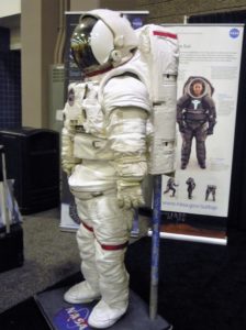 A NASA spacesuit was on exhibit on the IFAI Expo show floor. A potential manned mission to Mars will require textile innovations with a new set of criteria, say NASA contractors. 