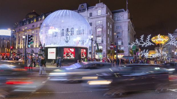 Snow globe in London at Piccadilly Circus.