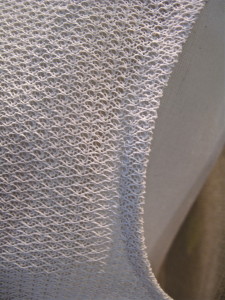 Detail of 100 percent recycled cotton dress.