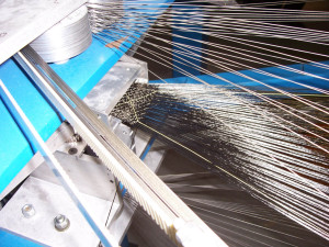 Bally Ribbon Mills has developed a quad-axial loom that allows for the insertion of yarn at 0, 90, +45 and -45 degrees. Photo: Bally Ribbon Mills.