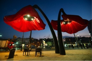 The installation is equipped with lights to illuminate the public space at night.